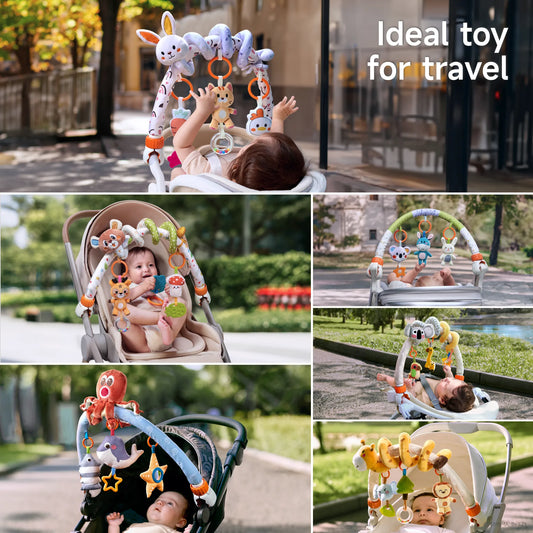 A baby playing with colorful baby arch toys while in a stroller or car seat. Multiple designs showcase soft plush animals, rattles, and textured elements securely attached for interactive play. Ideal for travel, the toys provide sensory stimulation and fun for babies on the go.