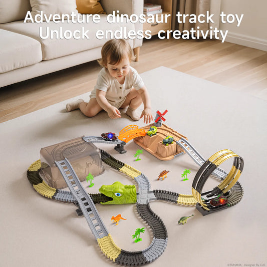 A young child playing on a carpet with an adventure dinosaur track toy set that includes looping tracks, a dinosaur head tunnel, small cars, plastic palm trees, and dinosaur figurines. The scene is in a cozy living room with text at the top that says "Adventure dinosaur track toy Unlock endless creativity.