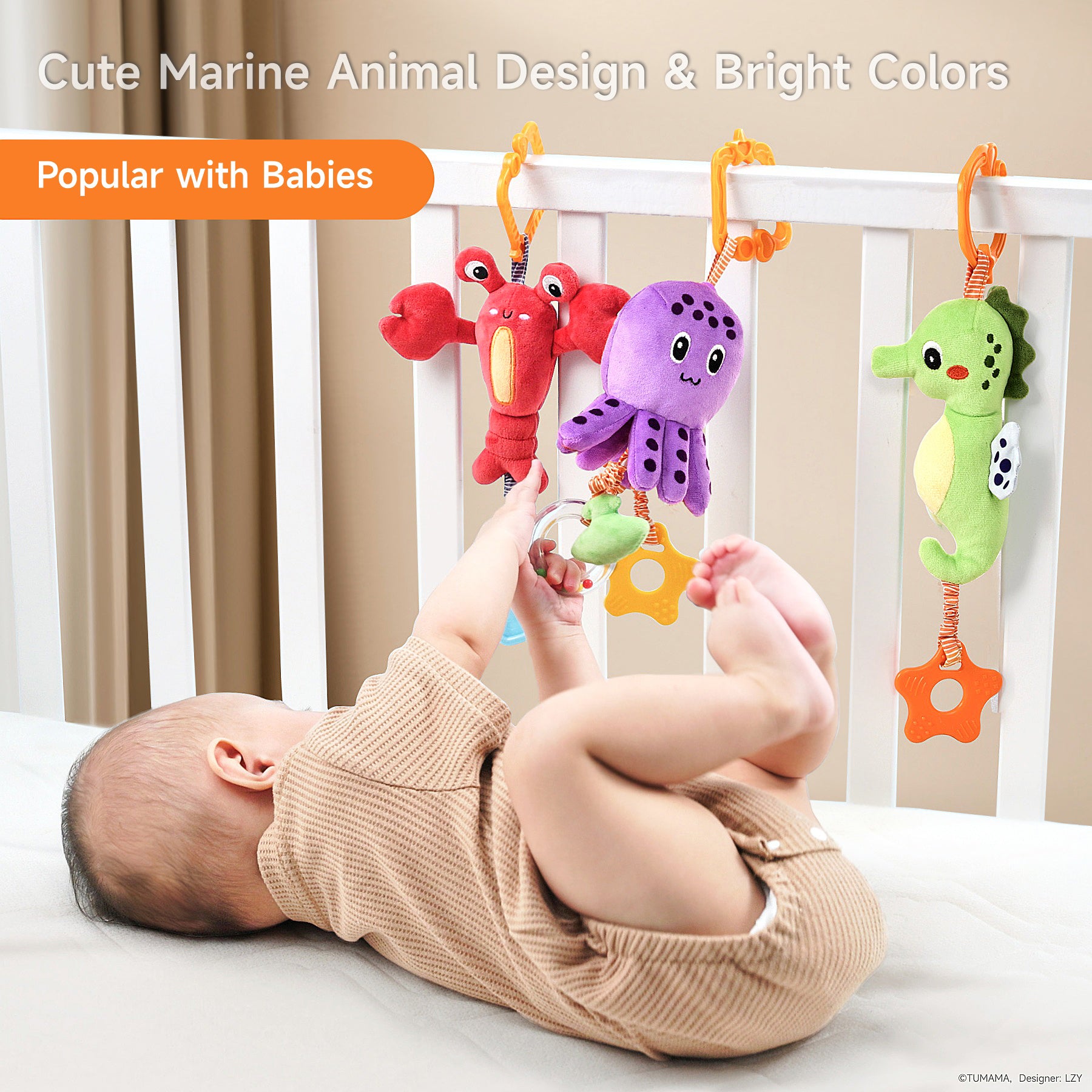 Baby lying in a crib, reaching up with hands and feet to play with three colorful plush marine animal toys—a red lobster, purple octopus, and green seahorse—hanging from the crib rail. The text overlay reads: "Cute Marine Animal Design & Bright Colors – Popular with Babies."