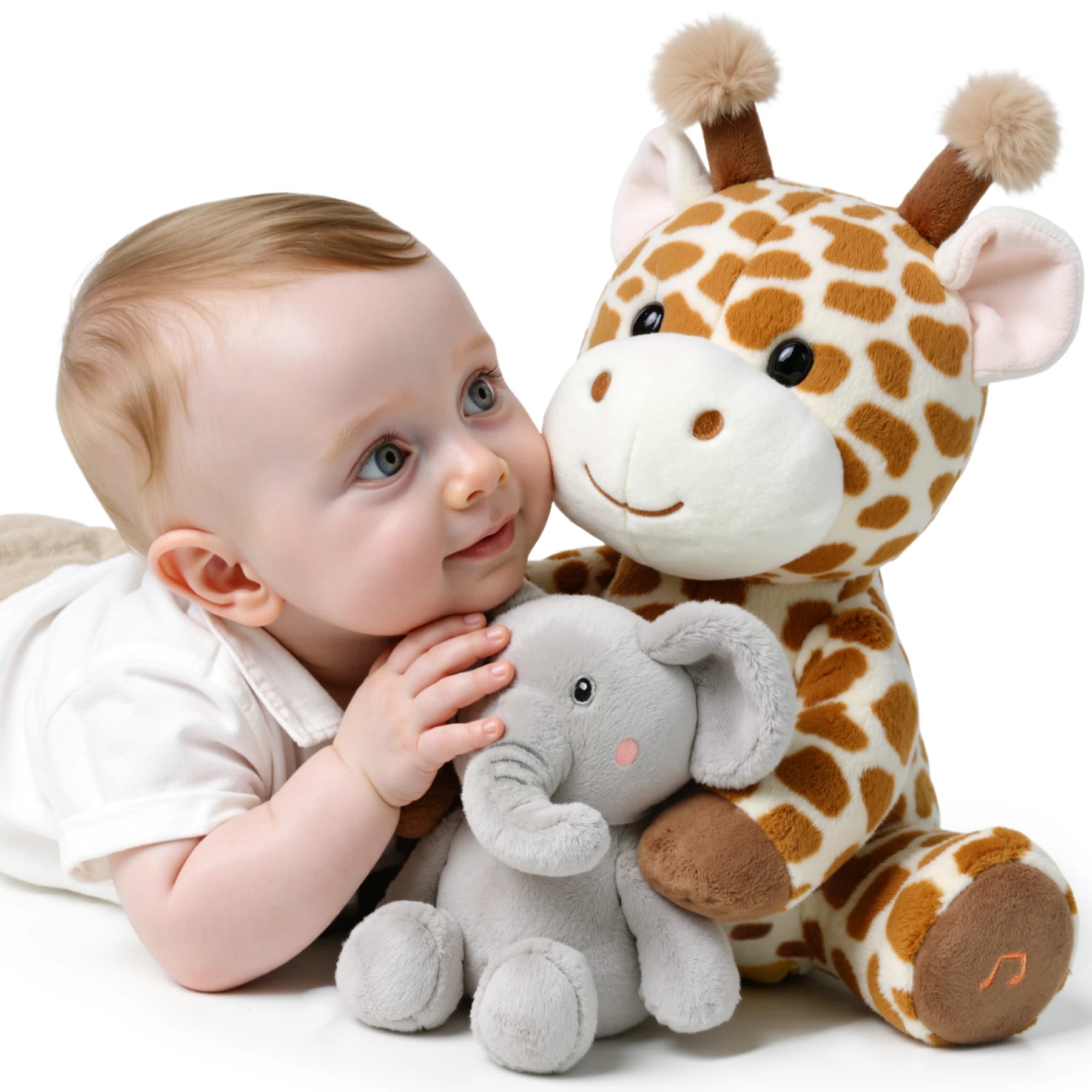 Smiling baby cuddling with a soft plush giraffe and elephant stuffed toy set on a white background; the giraffe features built-in sound functionality, ideal for interactive and comforting playtime.