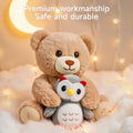 Cute Interactive teddy bear hugging an owl plush toy, sitting on fluffy clouds with fairy lights, highlighting premium craftsmanship and safe, durable design.