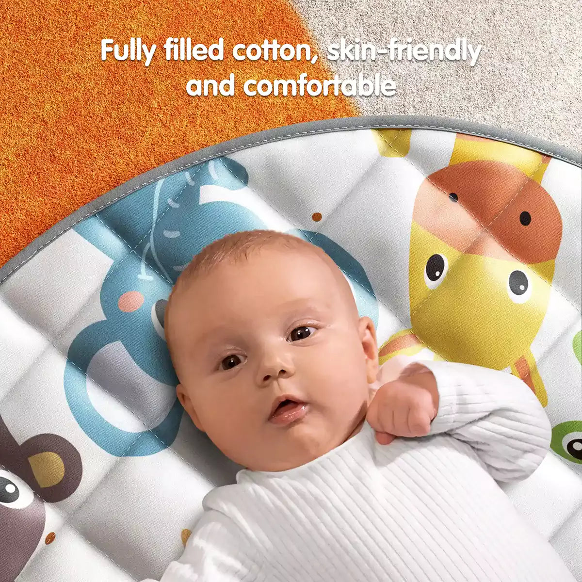 Baby lying on a soft play mat with colorful animal prints, showcasing fully filled cotton for a skin-friendly and comfortable surface.