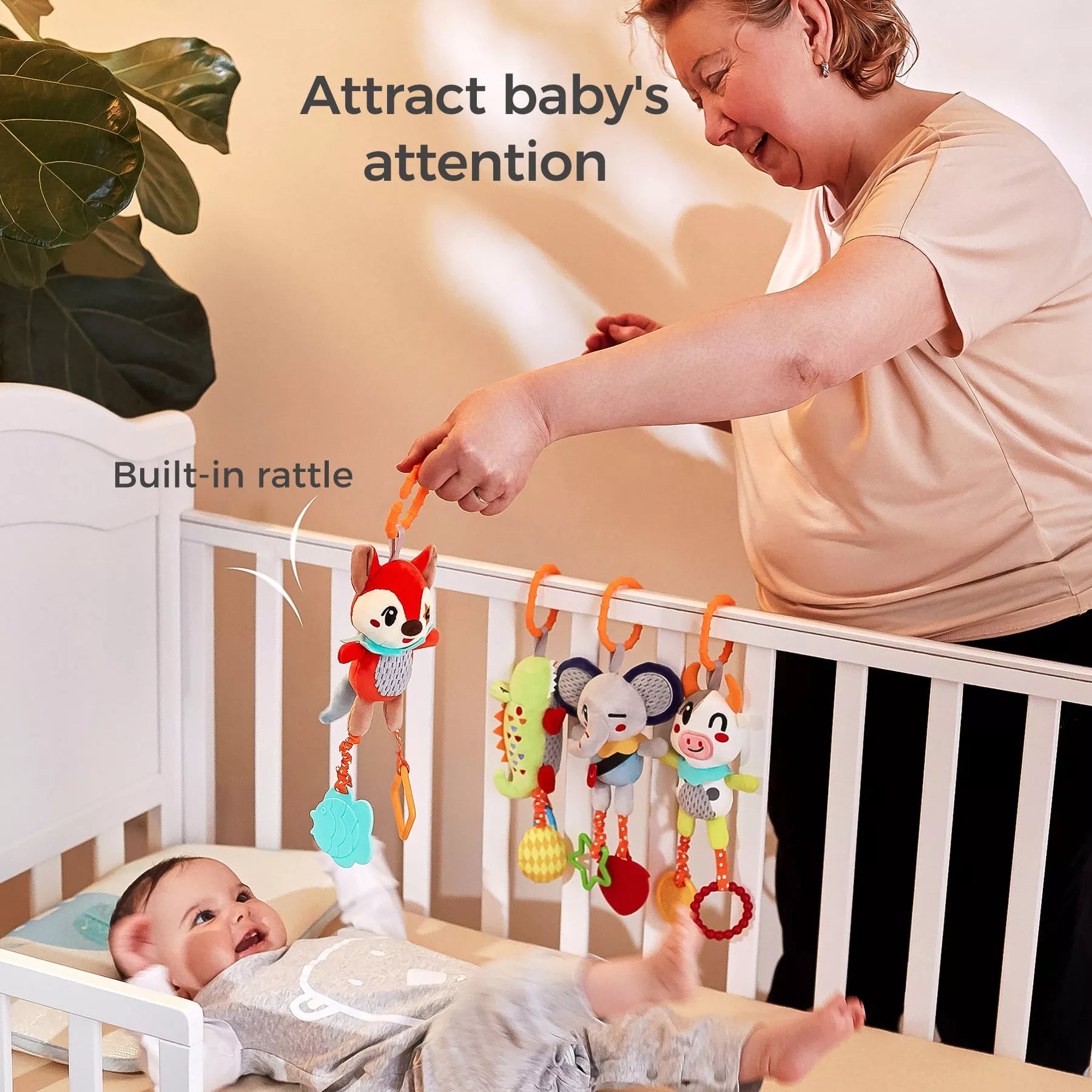 <tc>Babywagen-Hängespielzeug aus Plüsch mit Rassel und Beißring</tc>