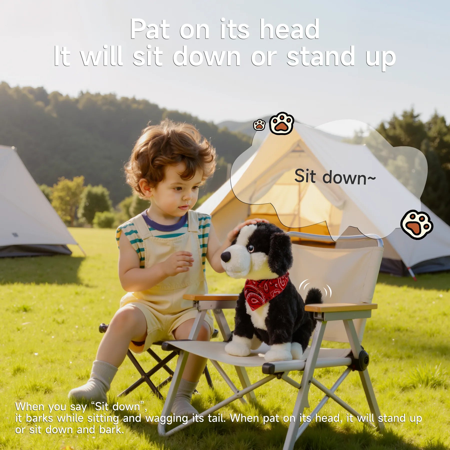 A child gently patting a voice-controlled realistic toy dog wearing a red bandana, sitting on a camping chair near a tent, as the toy responds to the “Sit down” command outdoors.