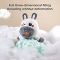 Close-up of a plush zebra baby security blanket with a three-dimensional filled head, surrounded by fluffy white material, with the text 