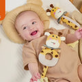Baby-playing-and-chewing-with-the-soft-giraffe-rattle-toy